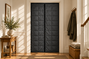 Magnetic thermal curtain installed in an ivory doorway